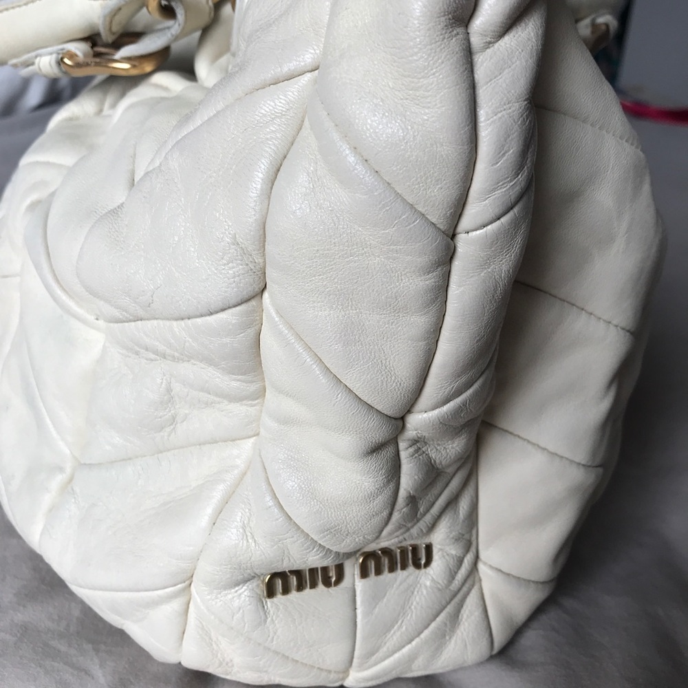 MiuMiu quilted cream shoulder bag